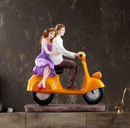 Scooter Couple Statue